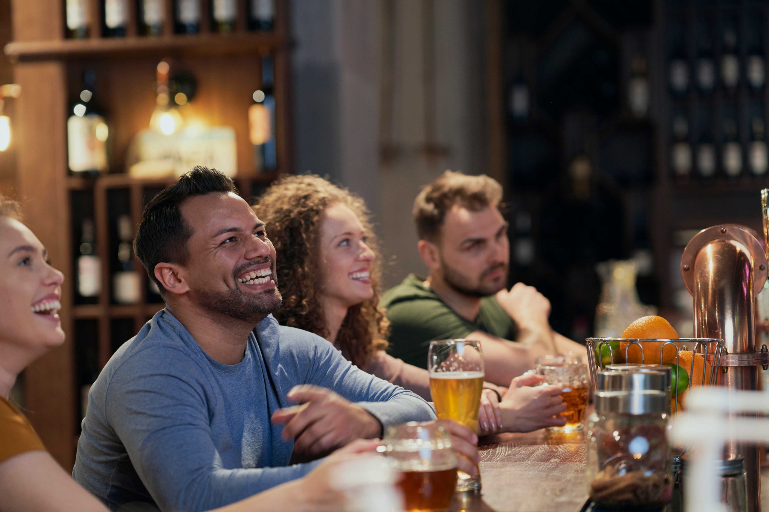 group of friends spending time in bar together 2026 03 13 05 50 07 utc(1)